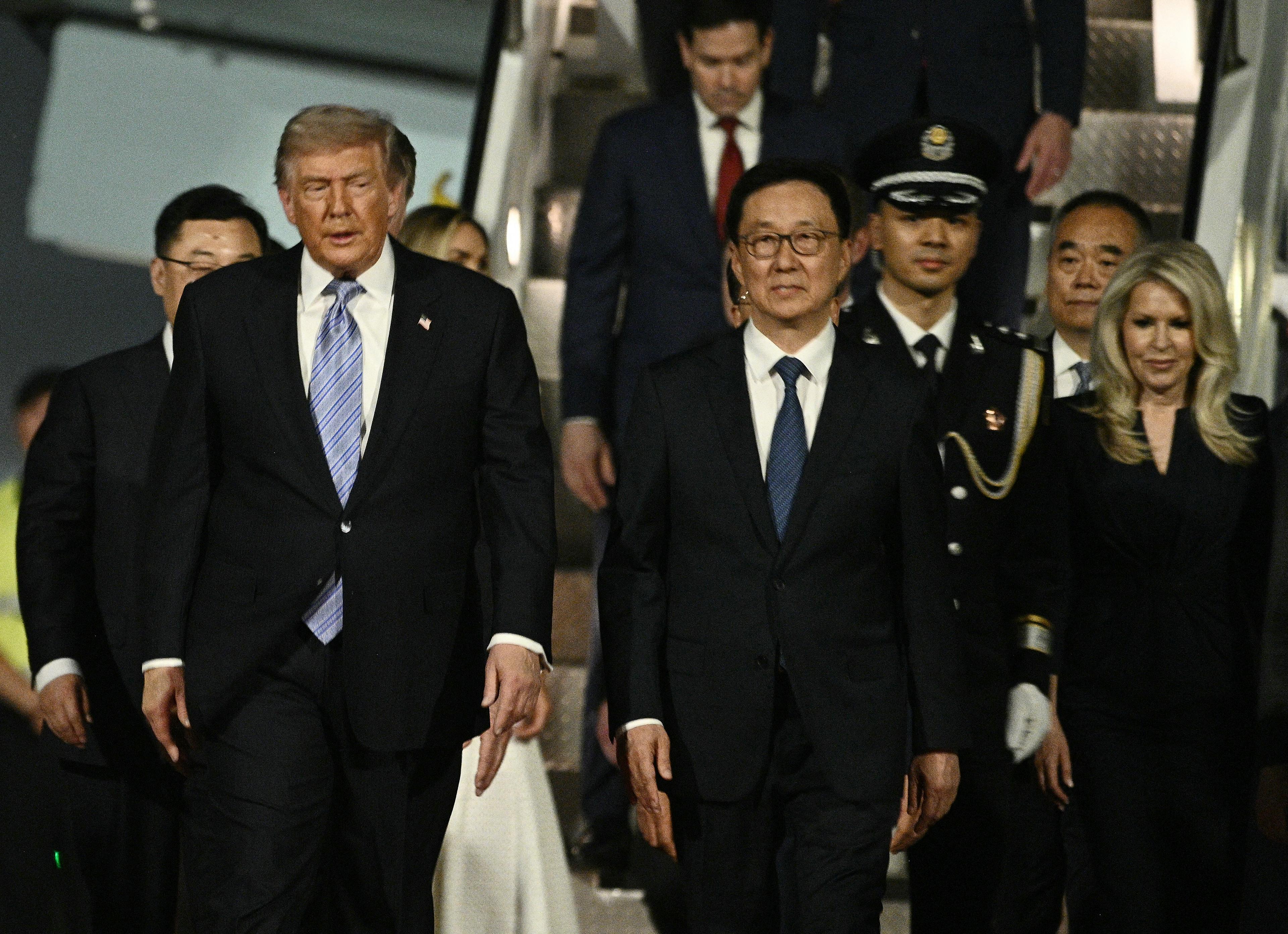 Trump Lands In Beijing For Two-Day Meeting With Xi Jinping