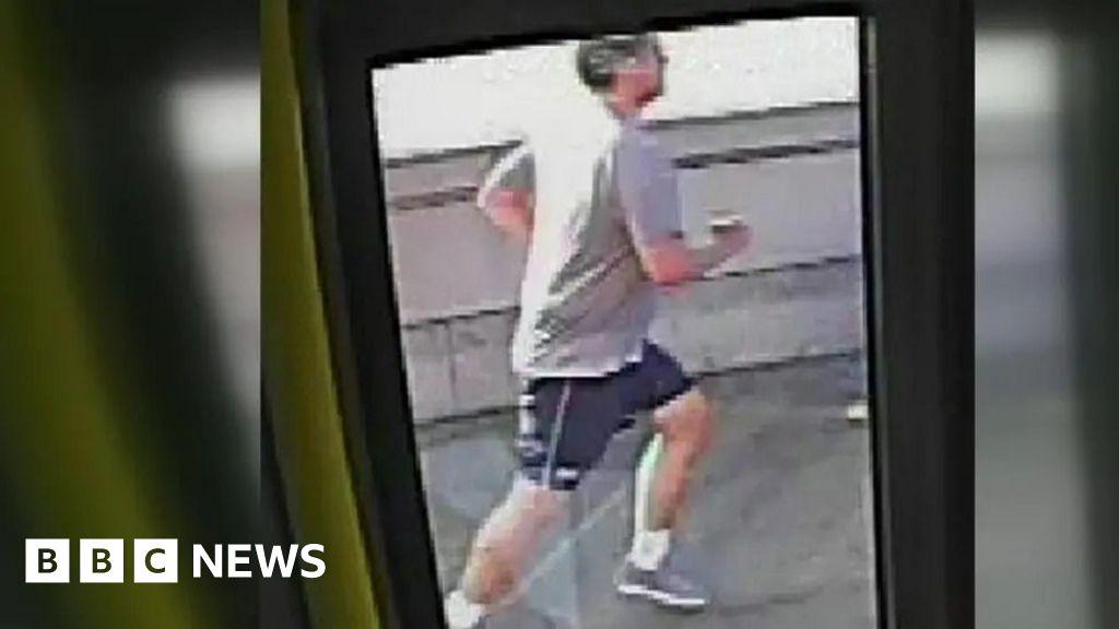 Man bailed after woman pushed into path of bus