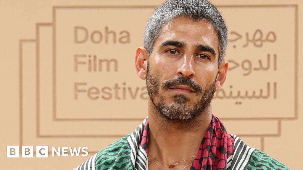 US-Kuwaiti journalist held in Kuwait over social media posts acquitted, lawyers say